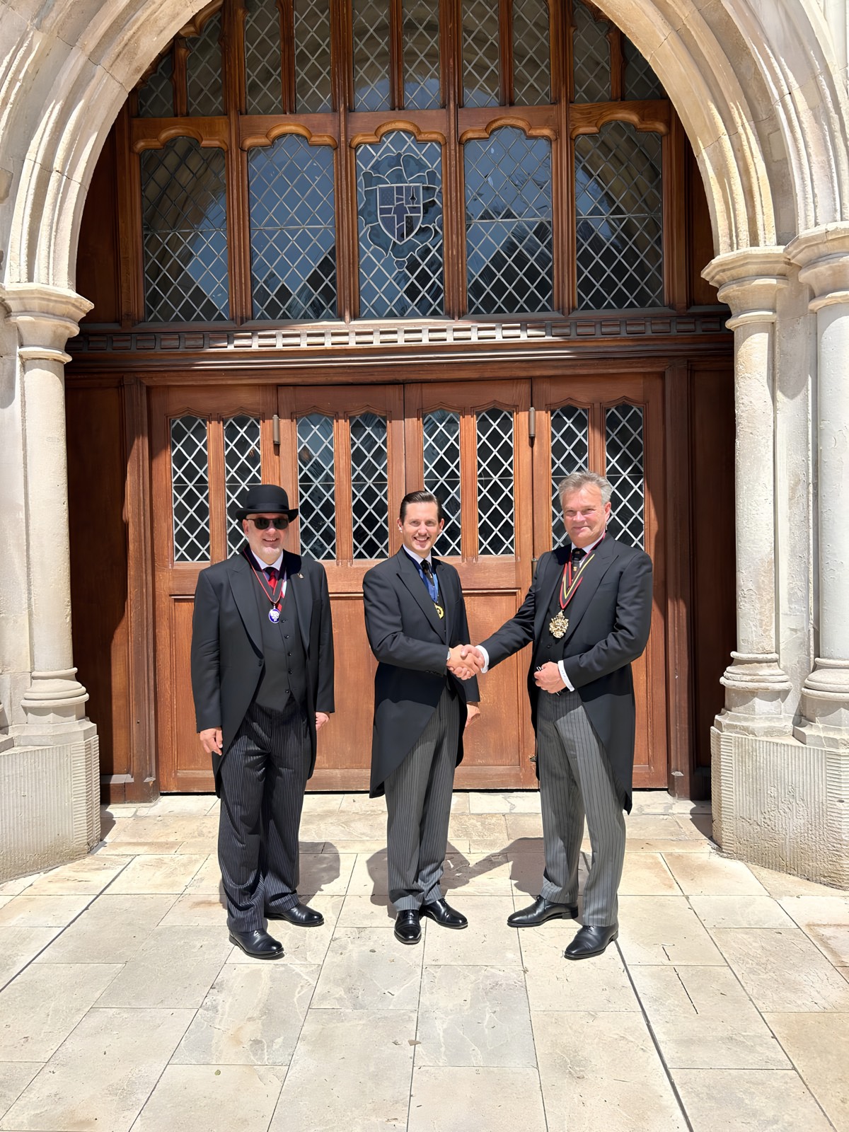 Liam Randall, wearing the Ale-Conner&rsquo;s badge of office, congratulated at the entrance to Guildhall after the election at Common Hall.