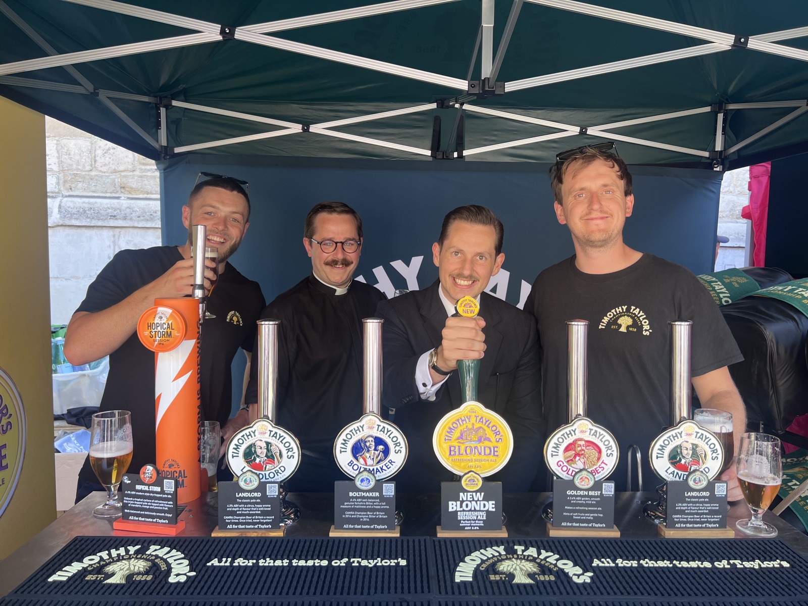 Behind the Timothy Taylor&rsquo;s stall in Guildhall Yard, the Ale-Conner pulls a pint of the brewery&rsquo;s new Blonde at the City Beer Festival.